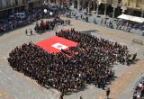 Una imatge de l'acció que s'ha fet aquest dilluns a la plaça del Mercadal