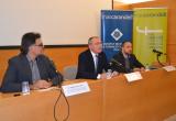 Foto de la conferència sobre la reforma horària a l'antic hospital amb l'alcalde Carles Pellicer al centre de la imatge