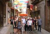 Foto de la presentació del concurs, amb els representants dels comerciants del carrer Major