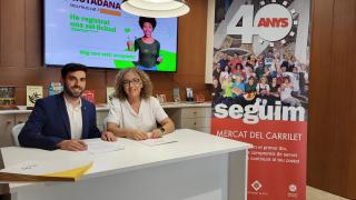 Signatura del contractes amb els paradistes del Mercat del Carrilet