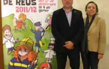 Imatge del cartell del Parc de Nadal amb els dos regidors responsables, Sebastià Domènech i M. Dolors Sardà.