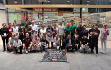 Fotografia de grup de les parades participants a l’11a edició del «Menja’t el Mercat»