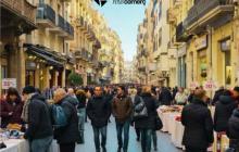 Cartell 51a edició de Les Botigues al Carrer